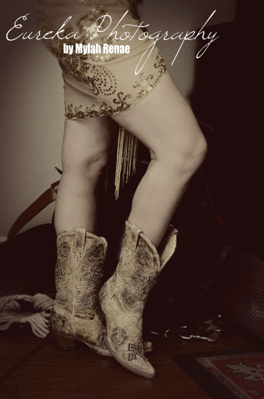 Boudoir photo of boots and skirt